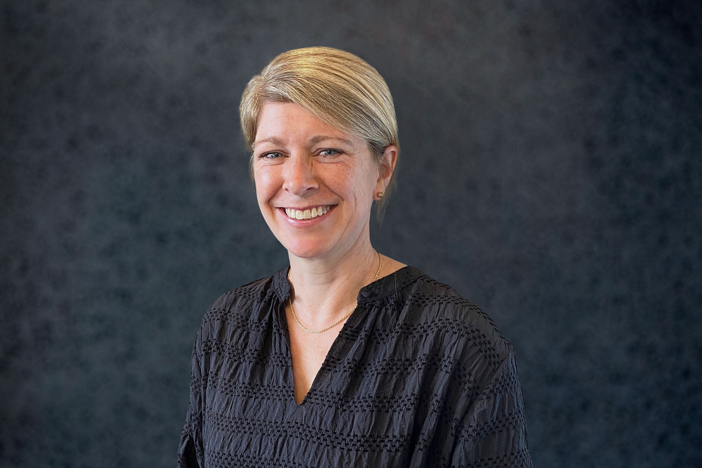 Lauren Wells — General Manager Customers